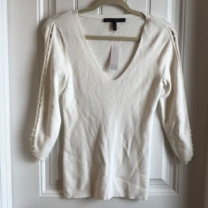 White beaded sweater